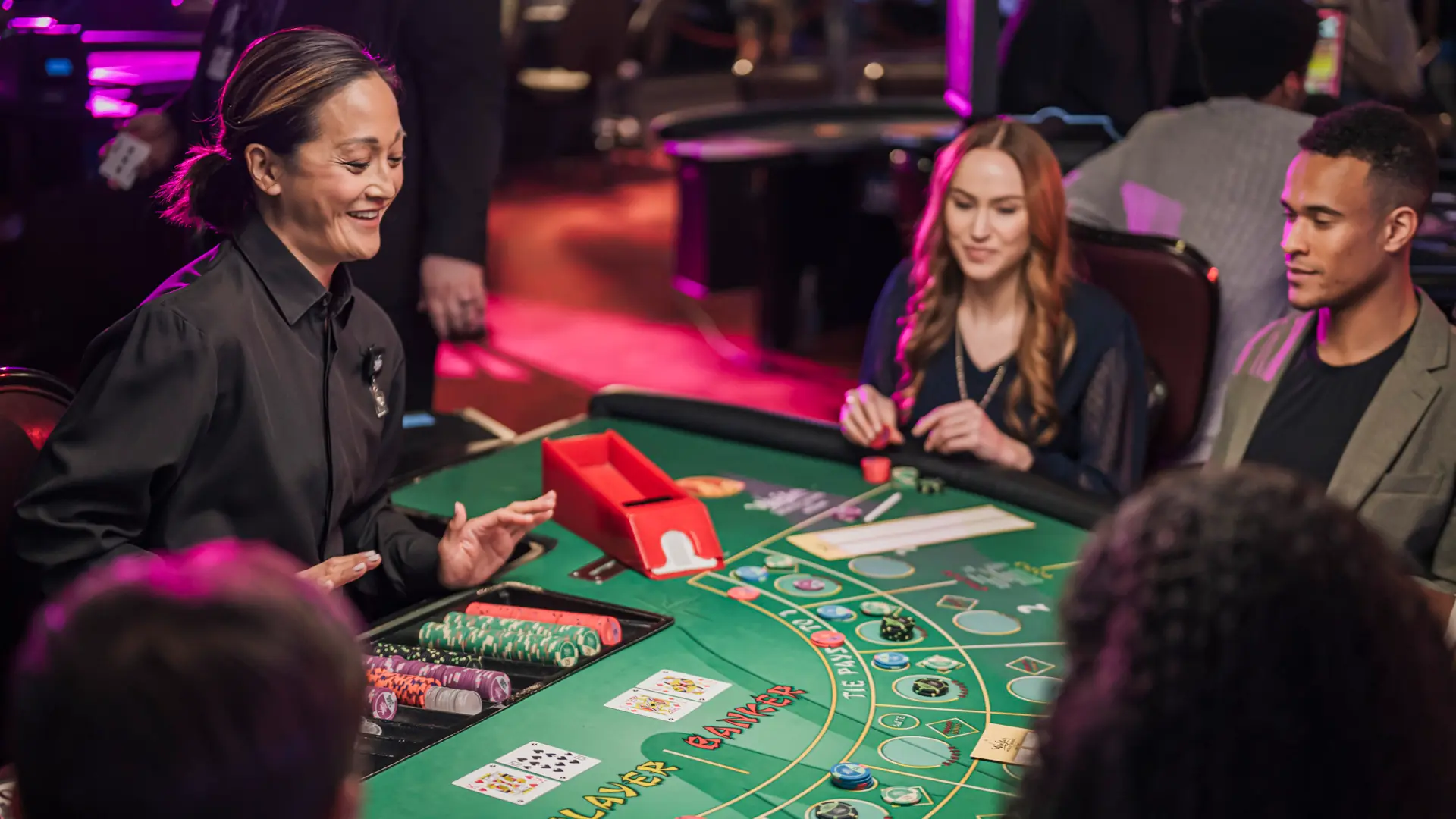 A group playing Mini Baccarat.