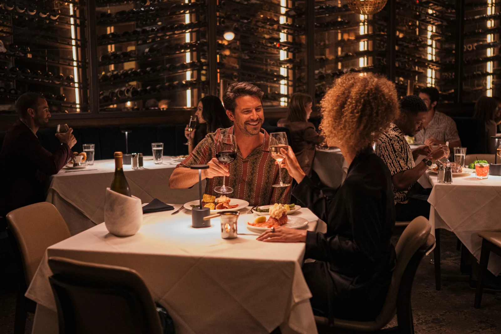 A couple enjoying dinner at Kirby's.
