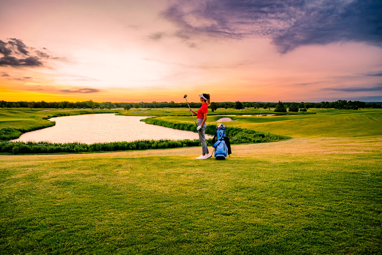 A sunset on the Scissortail golf course.