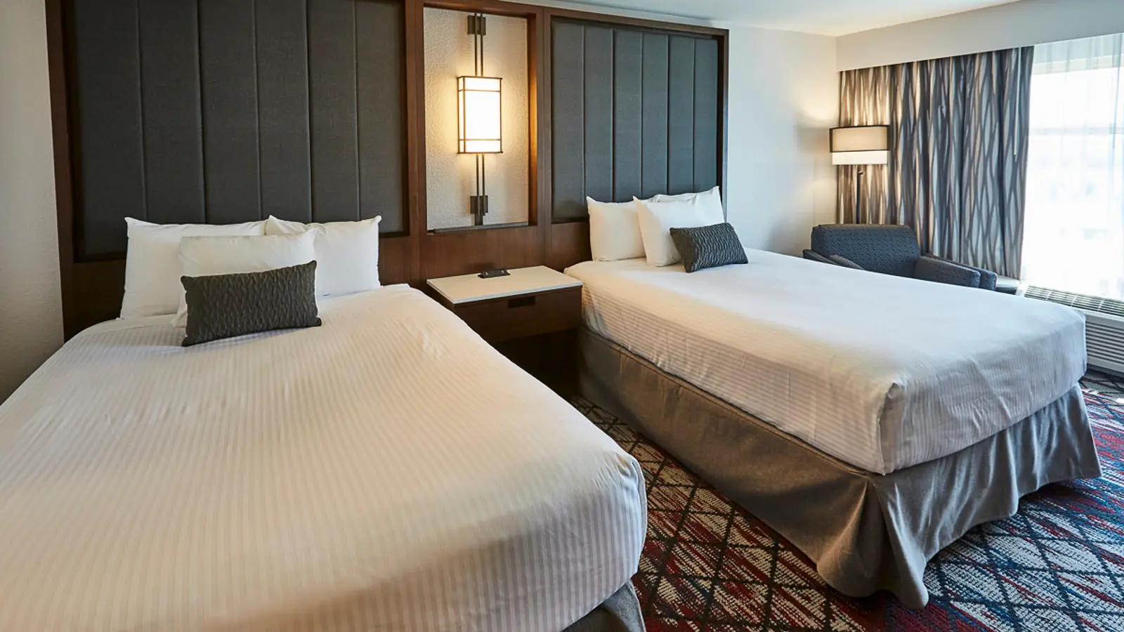 Two queen beds in the Casino Tower of the WinStar World Casino & Resort Hotel.