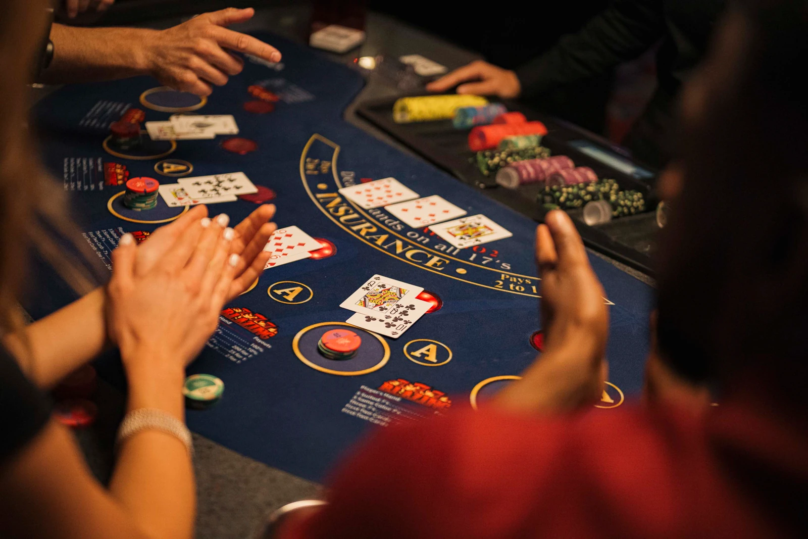 A group at a Blazing 777s Blackjack table.