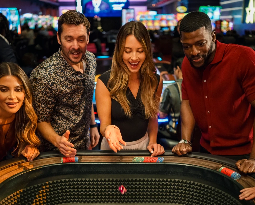 A group playing Craps at WinStar World Casino and Resort.