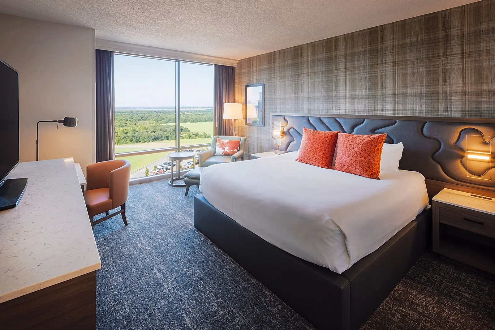 A king bed in the WinStar World Casino & Resort Hotel.