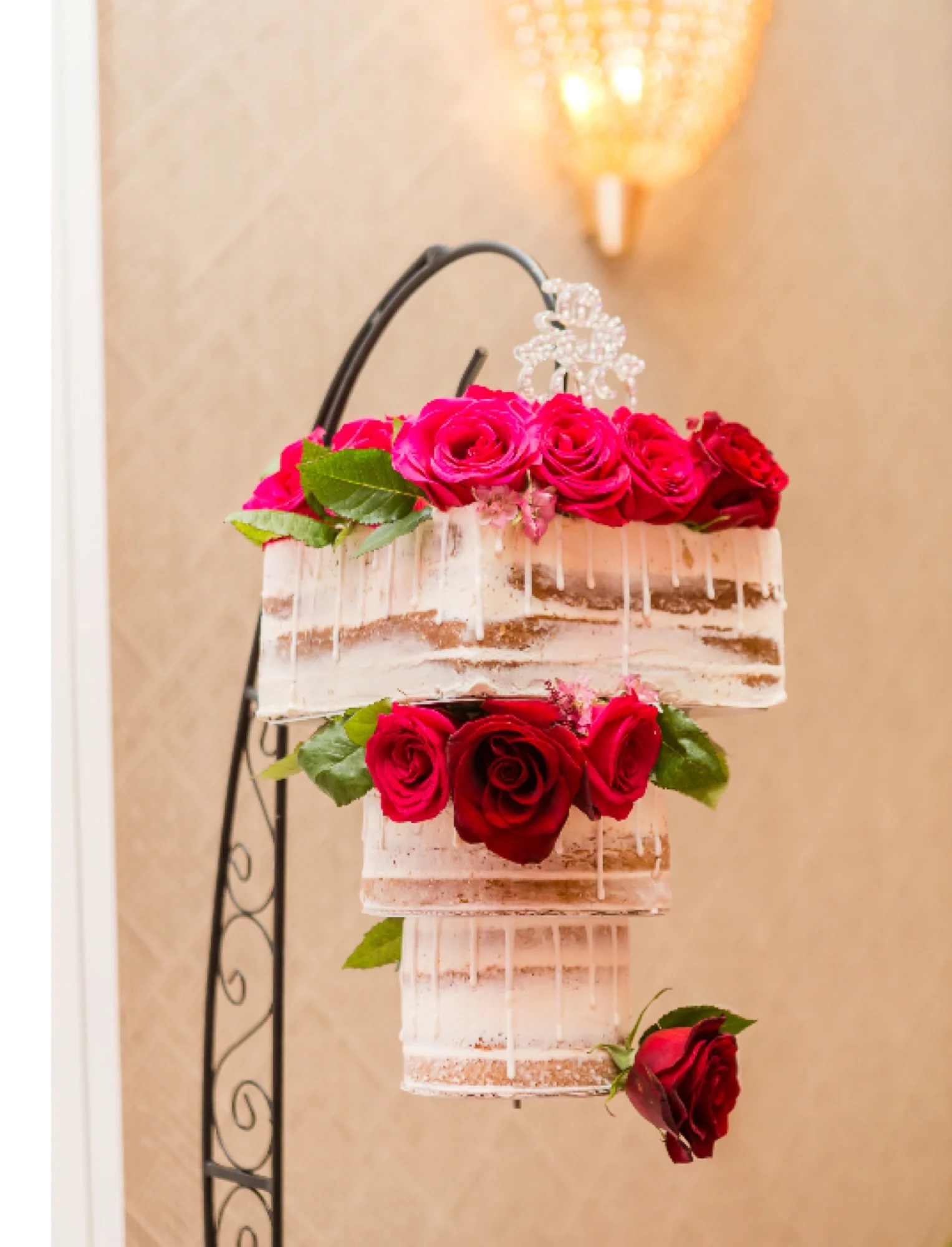 A wedding cake with roses.