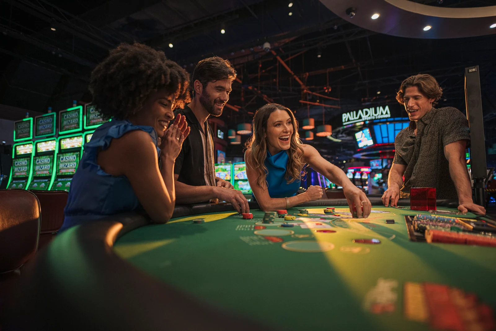 A group gathered around a table game at WinStar World Casino and Resort.