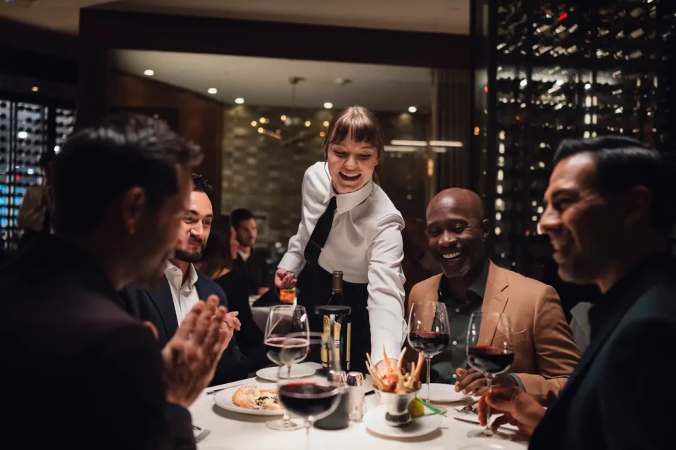 A server helping out a table at WinStar World Casino and Resort.